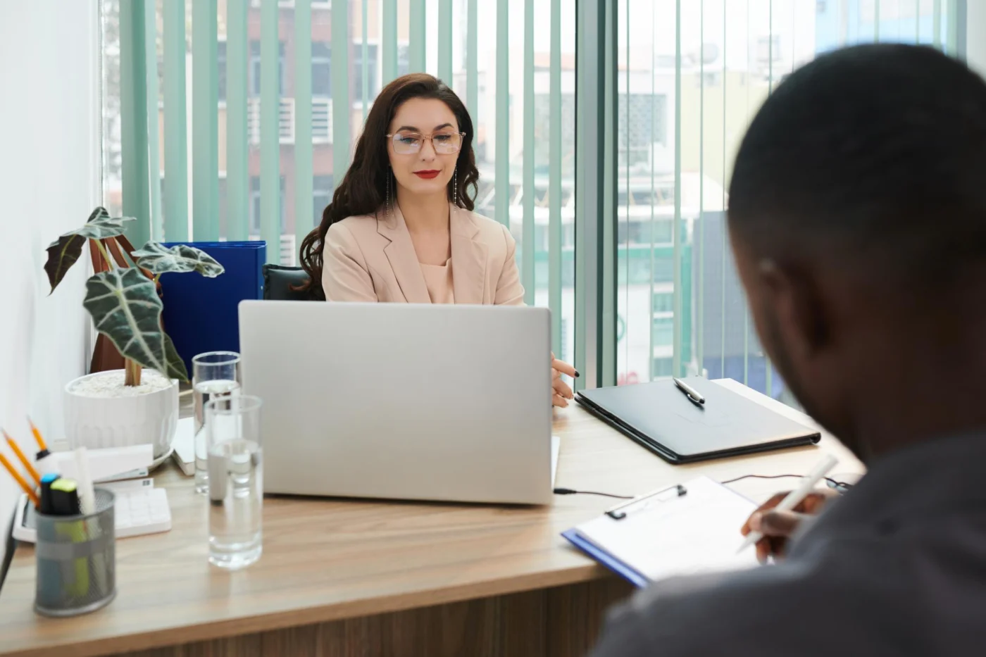 An employer interviewing a business development candidate