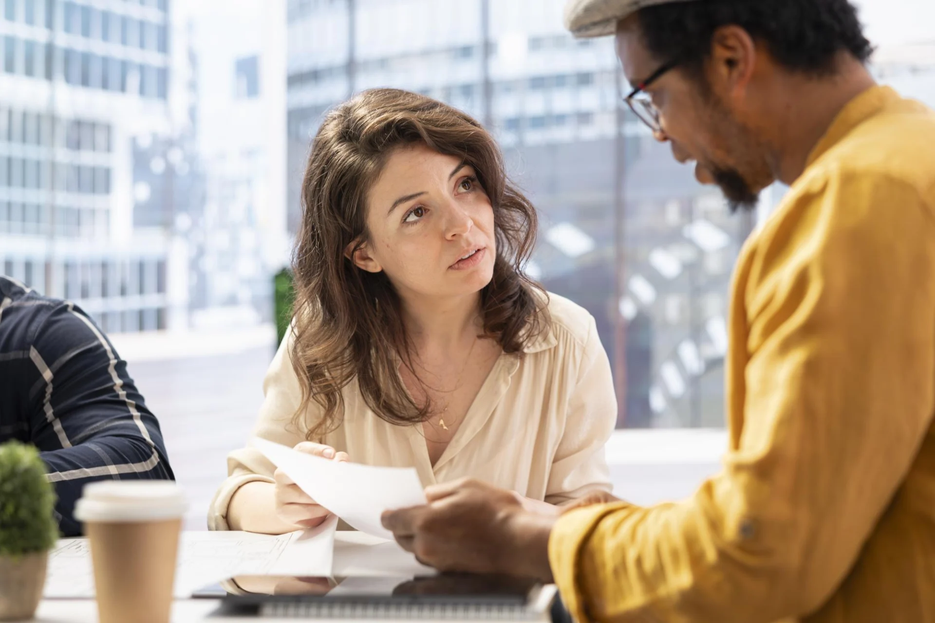 A young adult in a supportive one-to-one meeting with an employability advisor